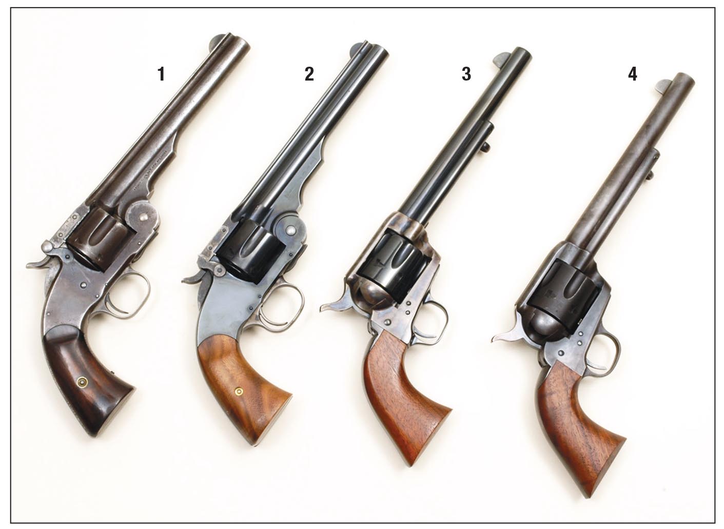 Mike has handloaded .45s for all these revolvers: (1) an original S&W Model No. 3 (Schofield), (2) new S&W Model No. 3 (Schofield), (3) Colt SAA 1873/1973 Commemorative and a (4) U.S. Firearms Custer Battlefield .45.